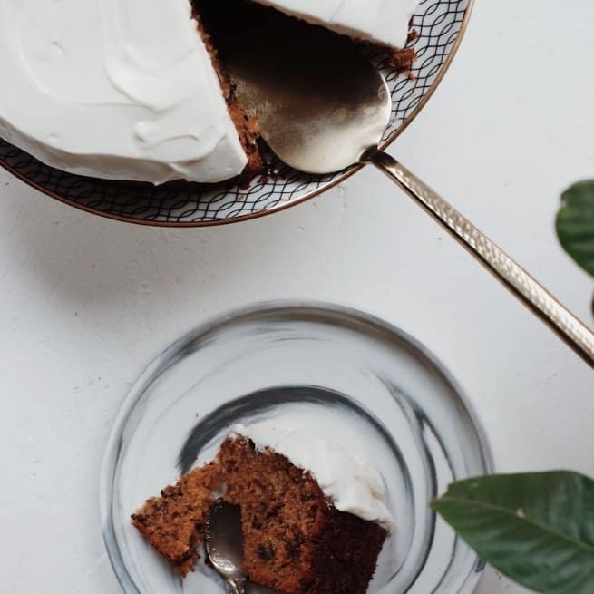 Mother's Day Carrot Cake with a slice cut out of it 