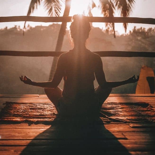 woman practicing yoga